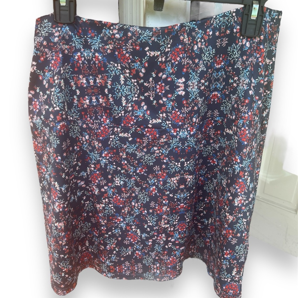 Flora blue skirt with vanity shorts. Elastic pull on waist. Size XL